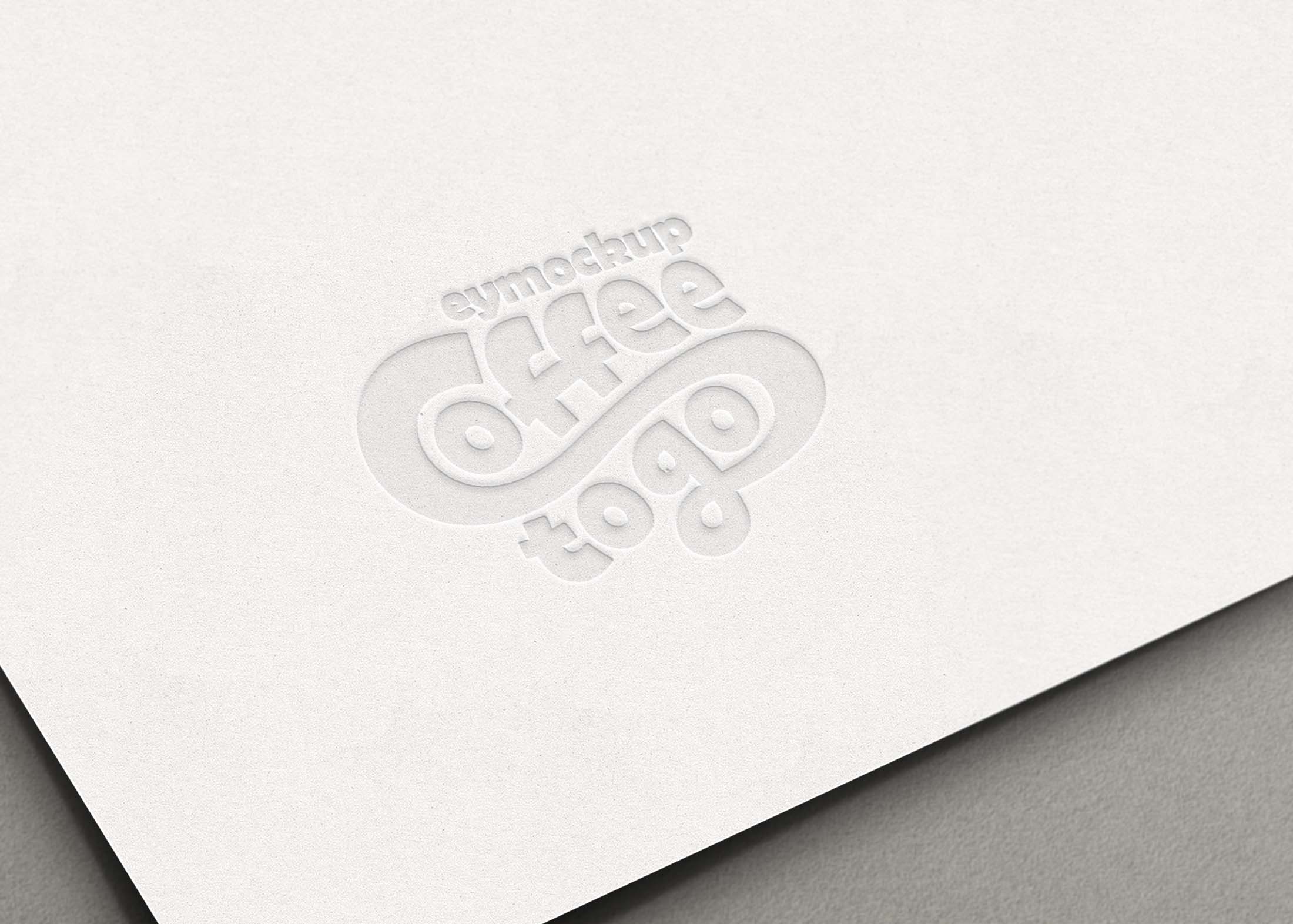 Free White Background Pressed Logo Mockup