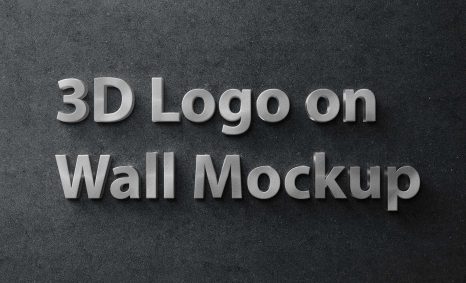 A three-dimensional gray logo is displayed on a textured dark wall mockup, emphasizing its depth and design.