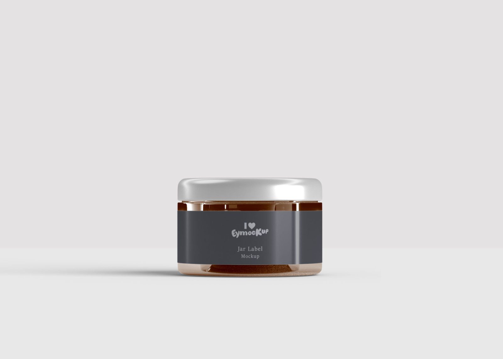 A round, dark brown cosmetic cream jar with a silver lid sits on a light gray surface, featuring a simple label design.
