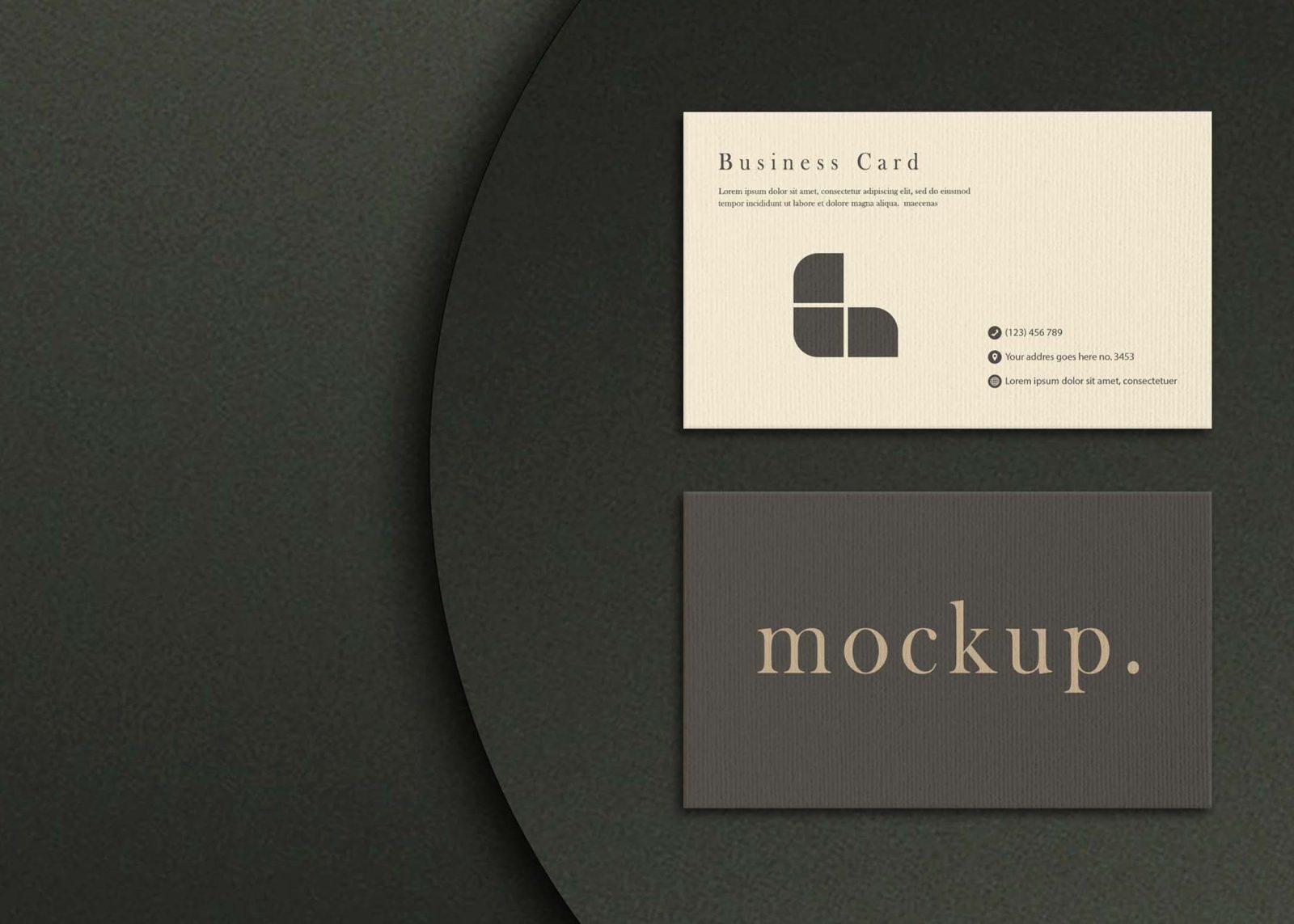 A light beige business card with a logo and contact details sits atop a dark circular background, alongside a dark card