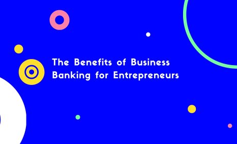 Bold text reads "The Benefits of Business Banking for Entrepreneurs" against a vibrant blue background with colorful cir