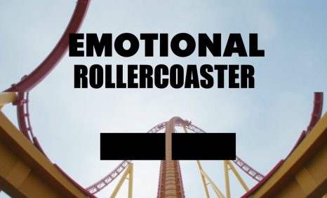 A towering rollercoaster looms against a blue sky, with bold text reading "EMOTIONAL ROLLERCOASTER" prominently displaye